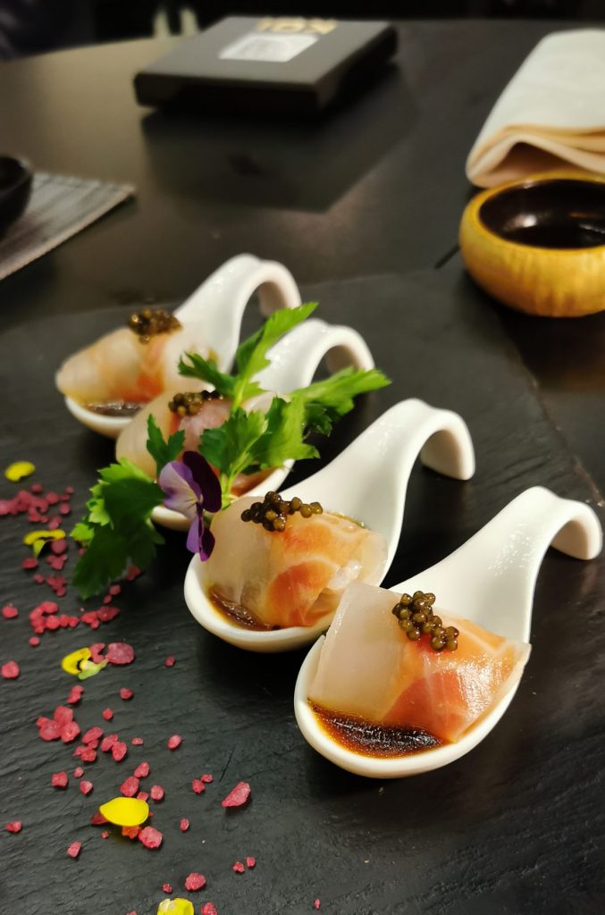 Branzino ripieno di scampo marinato in salsa yuzu